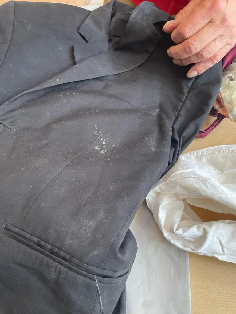 Detail of a blazer being repaired